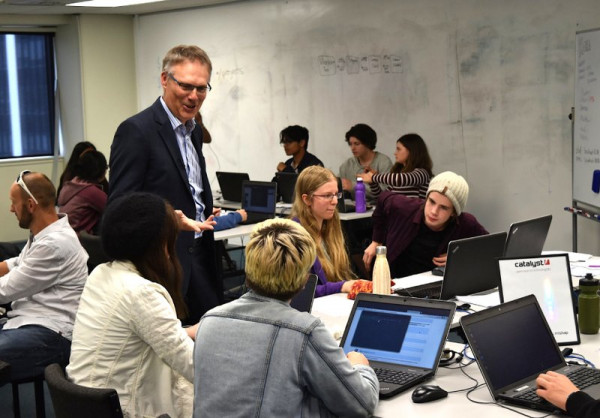 Director Don Christie talks with students at the 2019 Open Source Academy