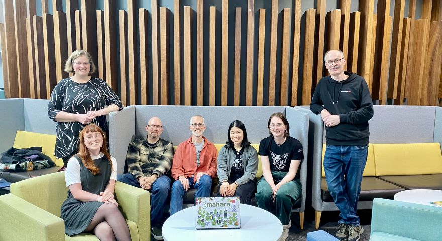  Alt text: A group photo of the Mahara project team at Catalyst smiling includes Kristina Hoepnner, Mahara project lead, Robert Lyon, Mahara technical lead,, Phil Sanity, senior developer, Doris Tam, developer, Yvonne Waterman, junior developerjoined by m